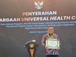 Pemkot Bitung Sukses Capai 100 Persen Kepesertaan JKN, Maurits Mantiri Terima Penghargaan UHC